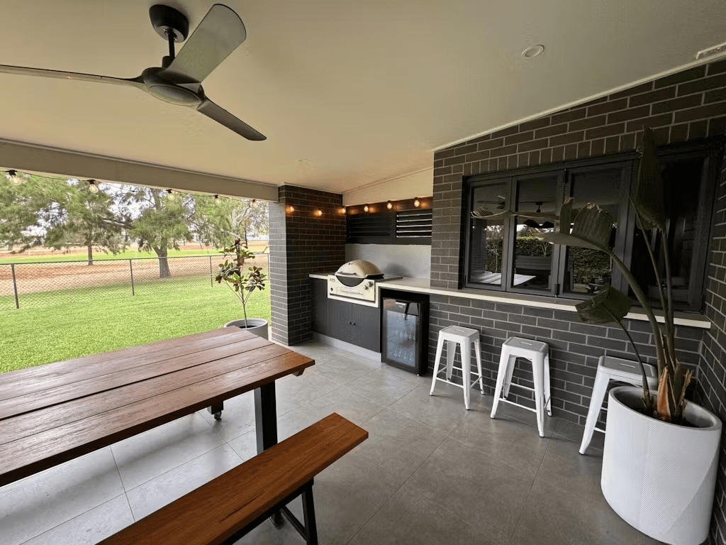 Schmick Alfresco Under Zero Australia's Coldest Beer Party Fridge With Blast Chill Mode - Model HUS-EX108 styled in outdoor entertaining setting